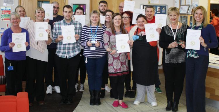 staff recieving a carers award